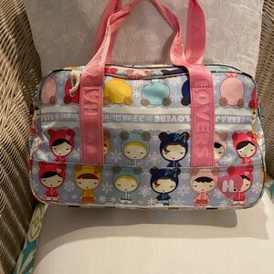 HARAJUKU Lovers ‼️PRICE DROP‼️
Fatal Attraction To
Cuteness Bag 13”x 8”💛🩵💚🩷